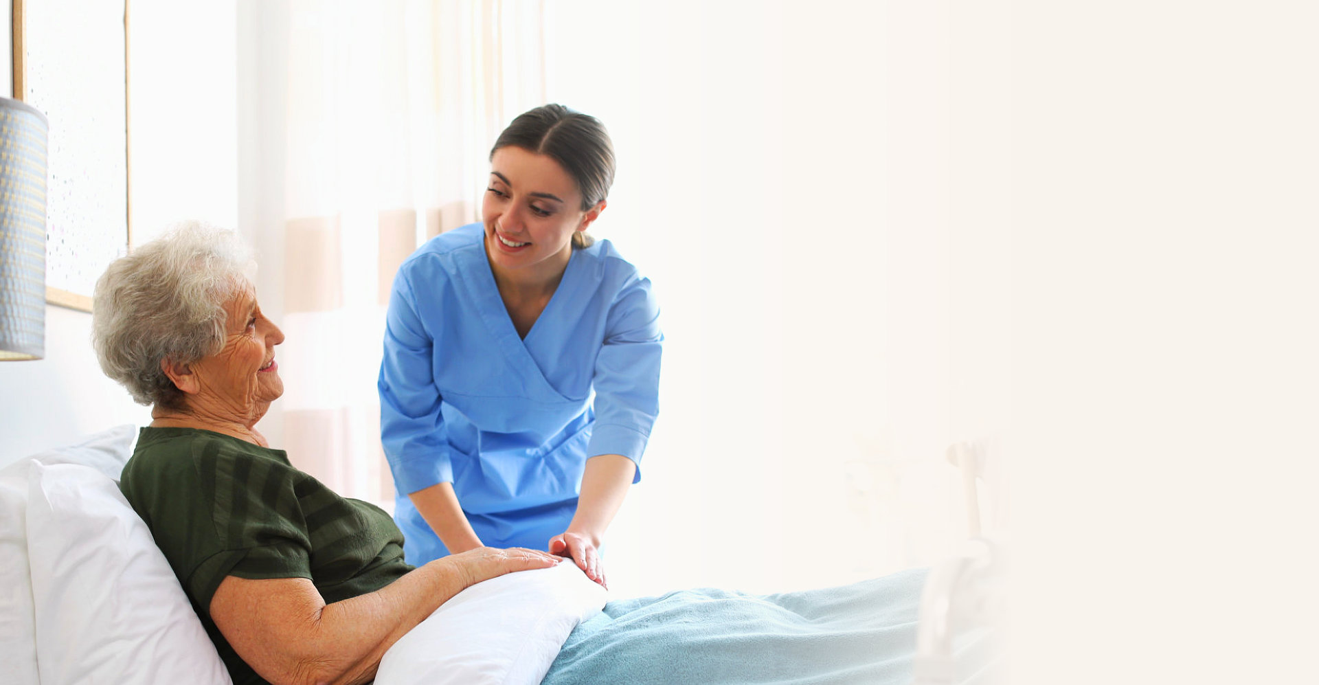 caregiver taking care of elderly